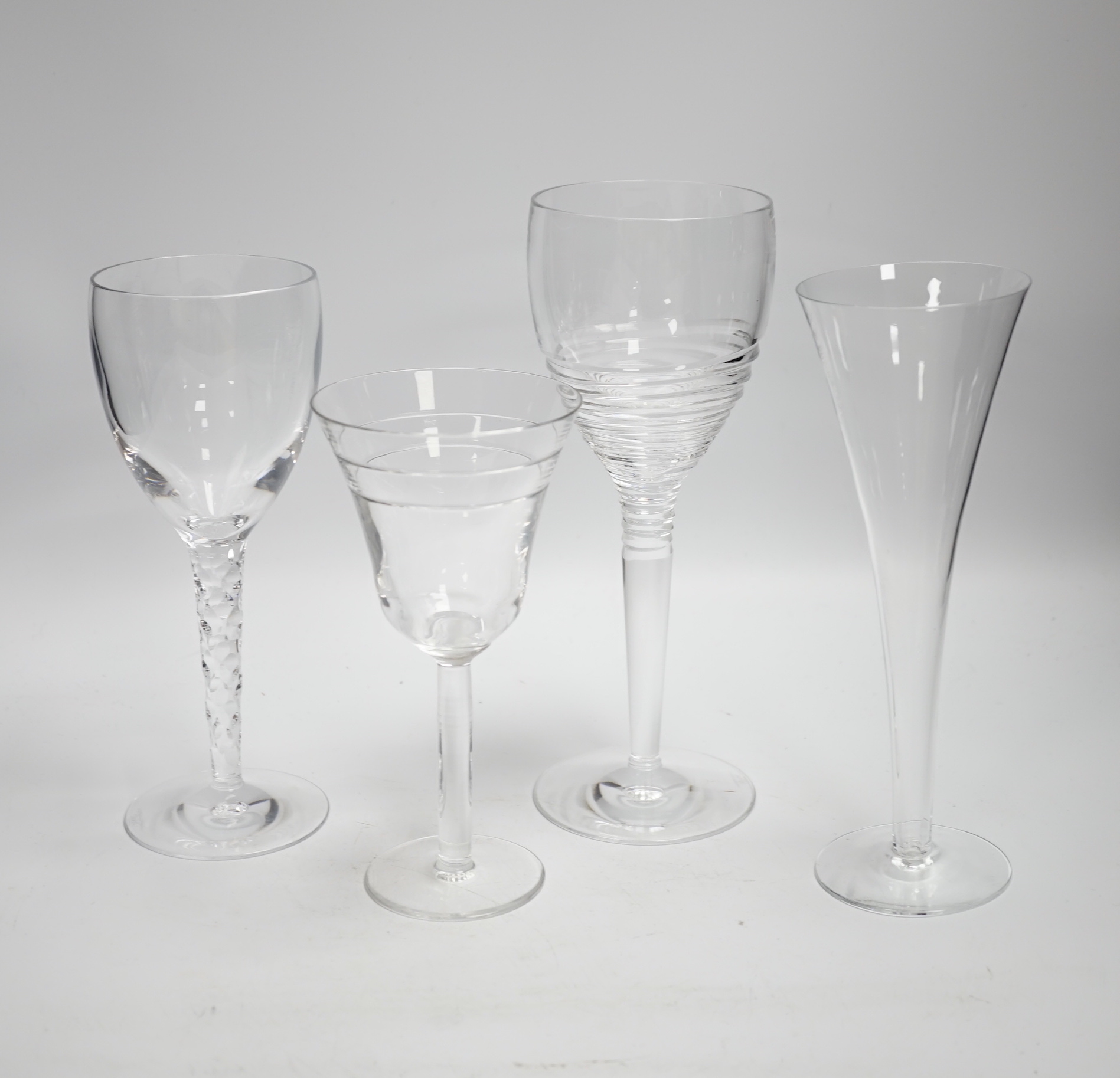 A group of mixed Jasper Conran, Stuart and Tiffany wine and champagne glasses, tallest 25cm high (13)